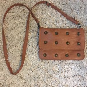 Tan side bag with adjustable strap